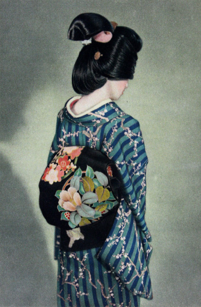 THE JAPANESE-STYLE COIFFURE HARMONIZES PERFECTLY IN THE. LADY'S ENSEMBLE